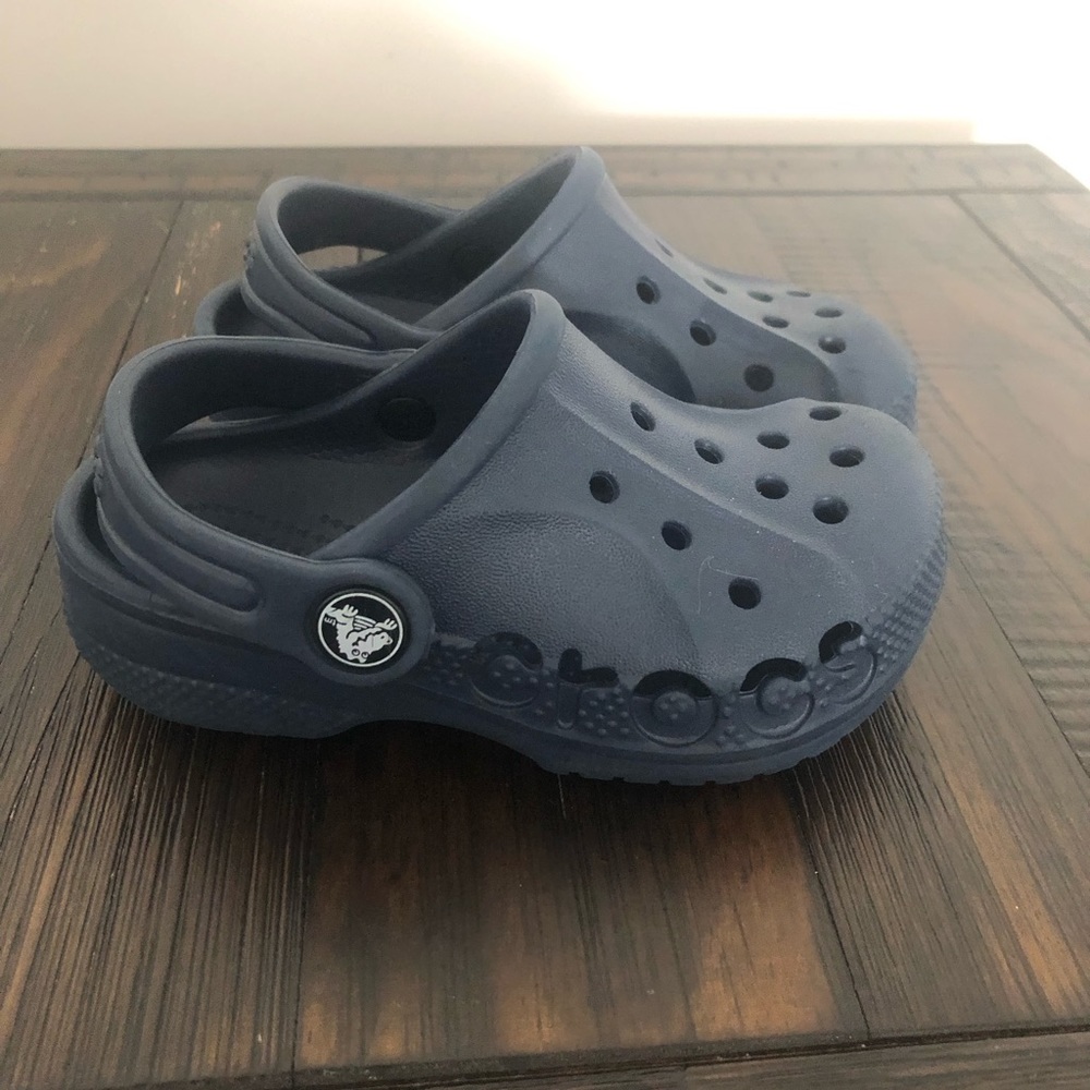 Worn once! Navy blue Crocs. Toddler size 8.